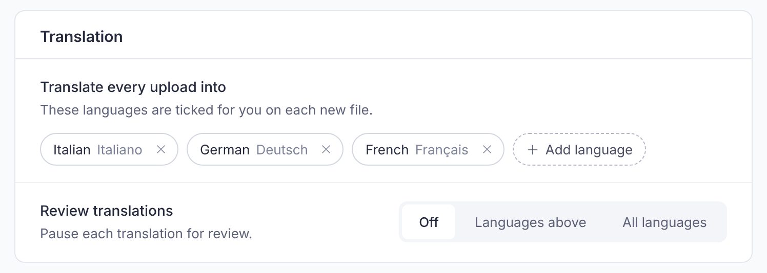 The Translation card on the Subtitle Defaults page, with three language chips under Translate every upload into, the Add language button, and Review translations set to Off, Languages above or All languages